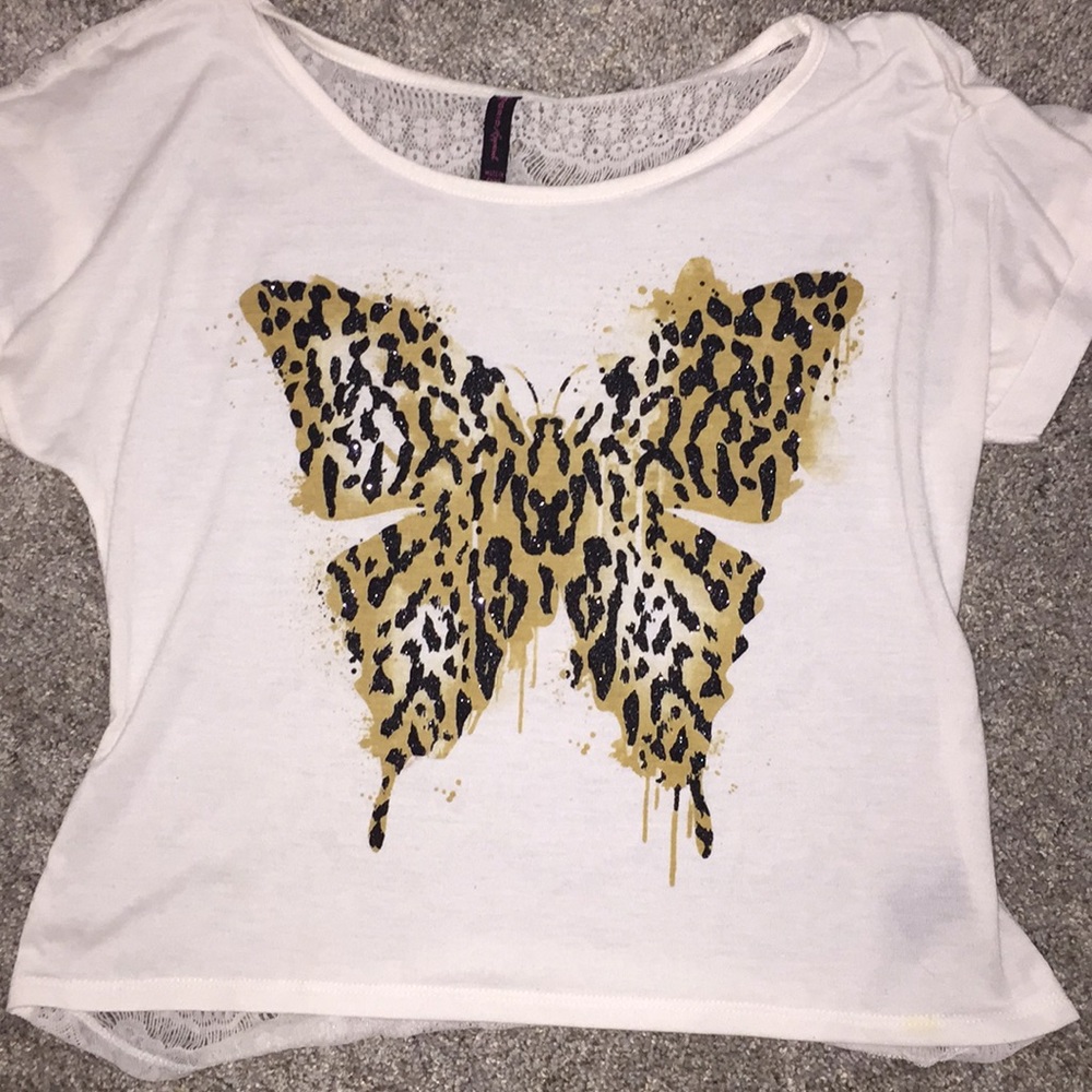 black, white, and gold butterfly shirt